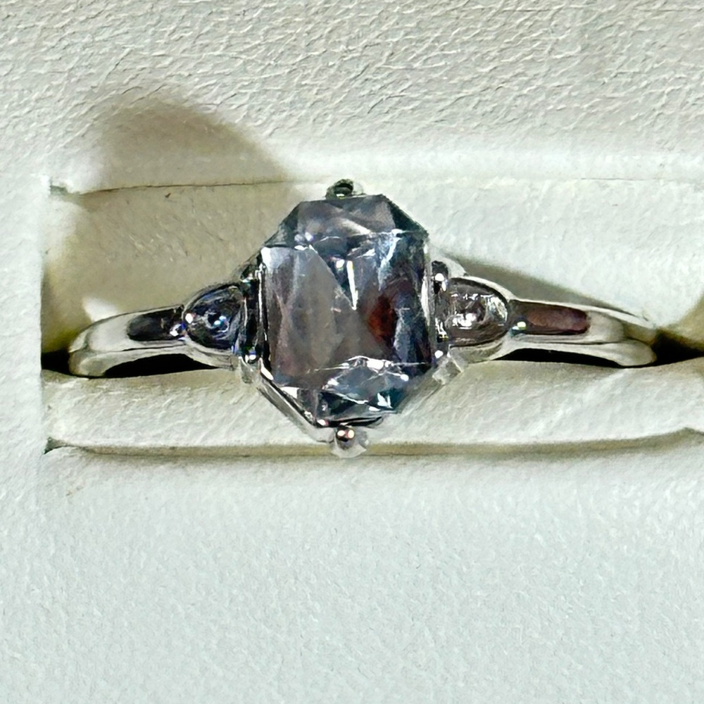 Silver ring w/Emerald cut Aquamarine & 2 clear round stones
